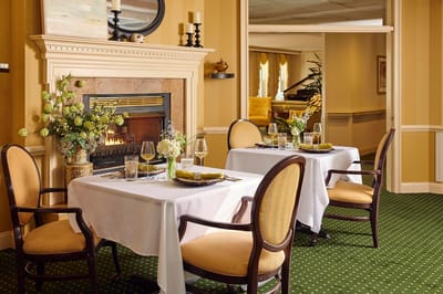 Elegant dining area with a cozy fireplace