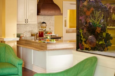 Common area with a kitchen and colorful decor
