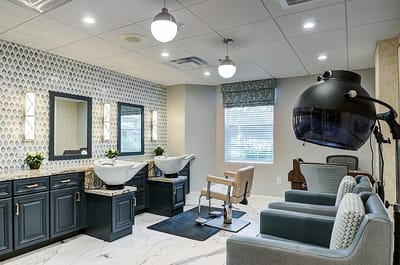 Interior view of a salon area with styling stations