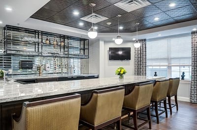 Interior view of a stylish common area with bar seating
