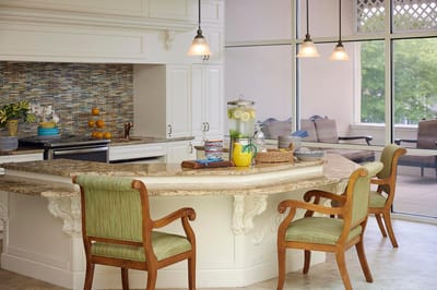 Bright, open kitchen with drinks and seating