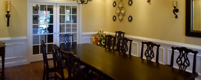 Interior view of a dining area with a long table