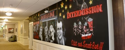 Colorful mural in a facility hallway