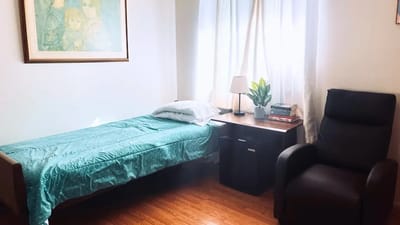 Cozy private resident room with warm lighting