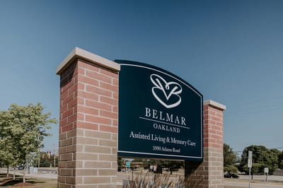 Facility sign displaying Belmar Oakland logo