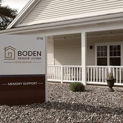 Exterior view of Boden Senior Living with signage