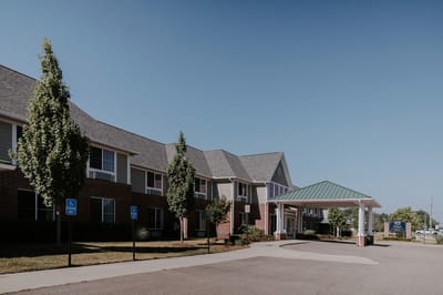 Exterior view of a senior living facility entrance