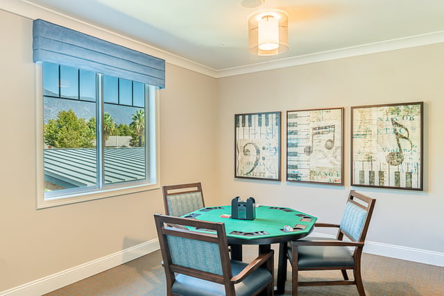 Interior view of a game room with a poker table