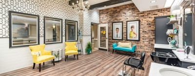 Stylish salon area with modern decor and seating