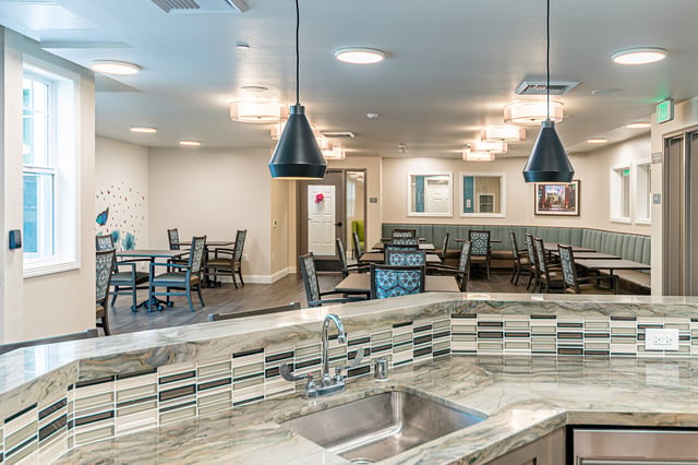 Bright dining area with tables and seating