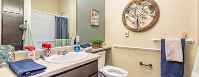 Bright and clean bathroom with floral decor