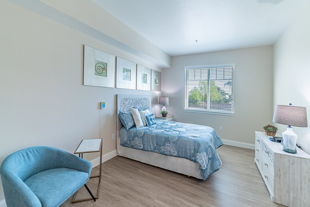 A well-furnished private bedroom at the facility