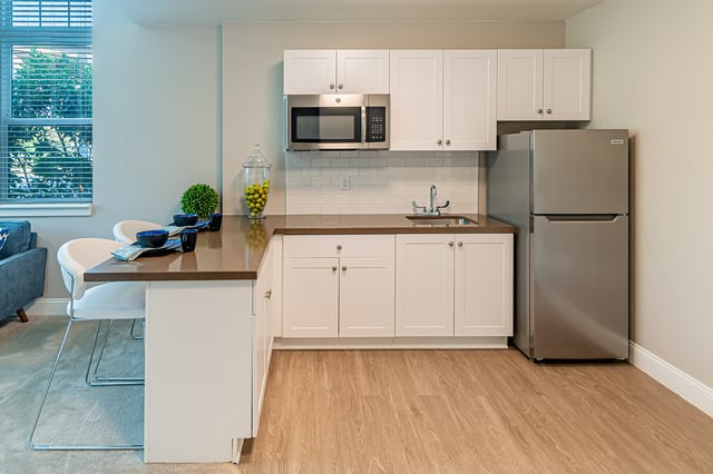 Modern kitchen area in a senior living unit