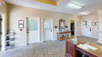 Reception area with a welcoming desk and doors