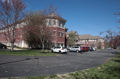 Exterior view of the facility with parking lot