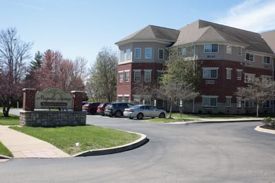 Exterior view of Magnolia Springs facility with signage