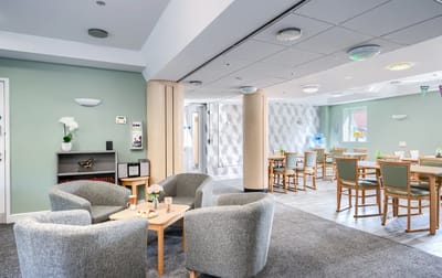 Interior common area with seating and dining space