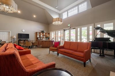 Interior common area with seating and piano