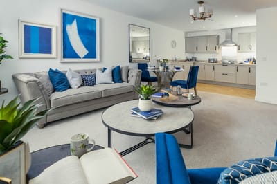 Bright common area with comfortable seating and art decor