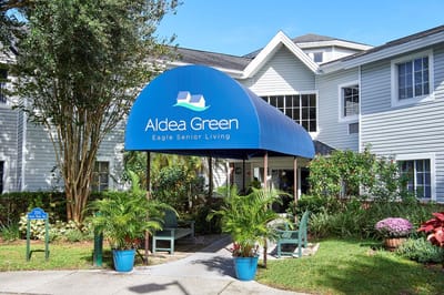 Exterior view of Aldea Green senior living facility