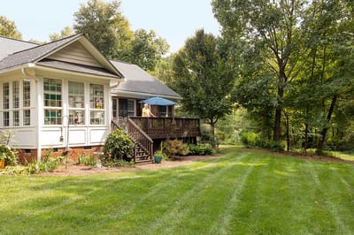 Exterior view of a facility with a well-maintained garden