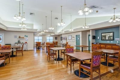 Bright interior of a dining area with tables and chairs
