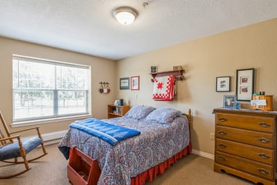 Cozy resident room with a bed and decorations