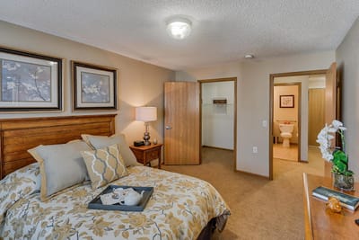 Well-furnished private resident room with floral decor