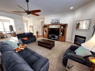 Cozy common area with comfortable seating and a fireplace