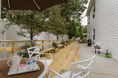 Outdoor seating area with snacks and drinks.