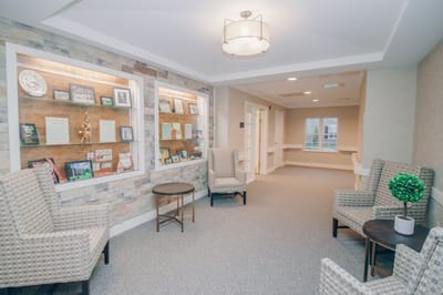 Common area with seating and decor in a warm interior