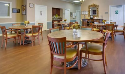 Bright dining area with tables and chairs