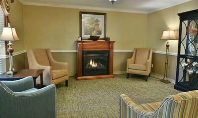 Cozy common area with seating and fireplace