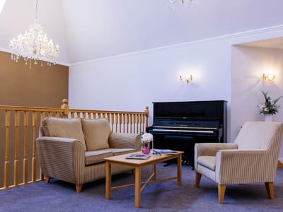 Comfortable seating area with a piano