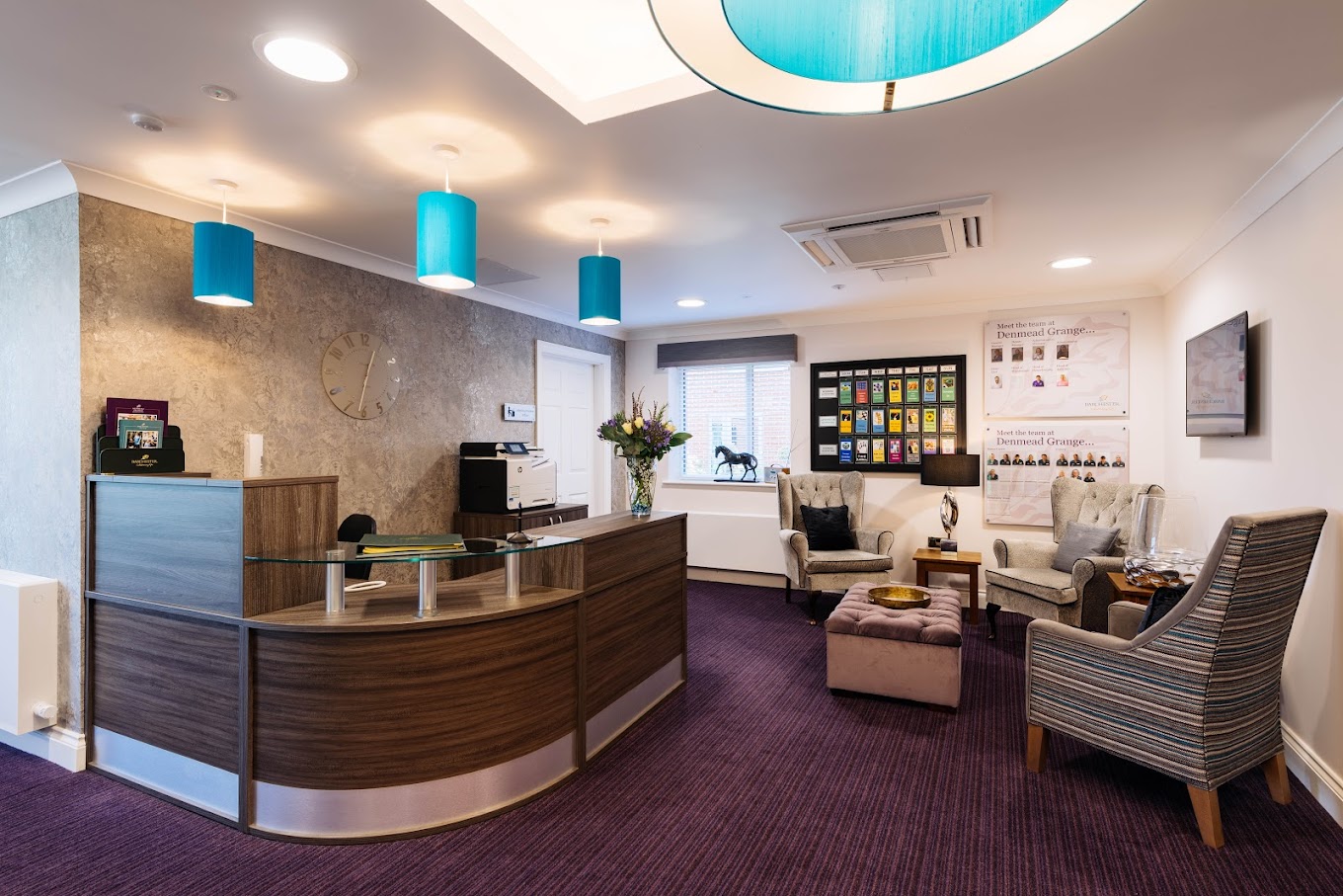 Bright reception area of a care home with seating