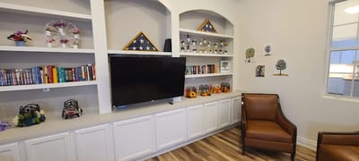 Interior common area with shelves and seating