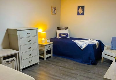Cozy interior view of a resident room with furniture