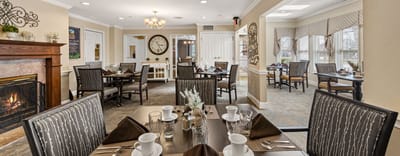 Dining area set for a meal in a cozy interior