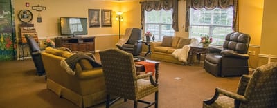 Common area with seating and television