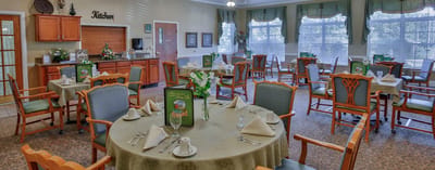 Dining area with neatly arranged tables and chairs