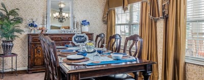 Elegant dining area set for a meal