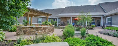 Outdoor garden area with seating and landscaping