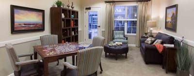 Cozy common area with seating and a table