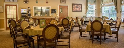Dining area setup with tables and chairs