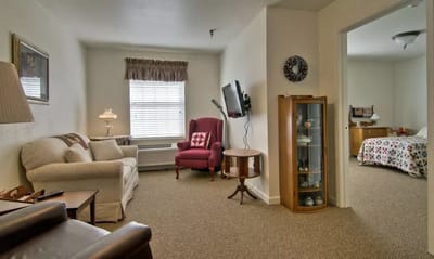 Cozy resident room with seating and decor