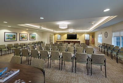 Common area with seating and artwork on the walls