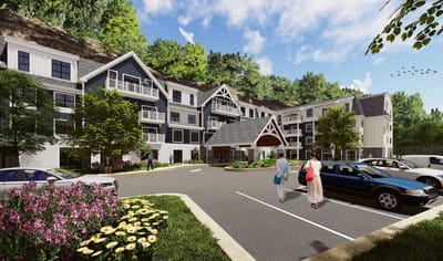 Exterior view of Brightview Harrison with residents and gardens