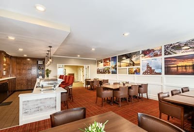 Interior view of a dining area with tables and decor
