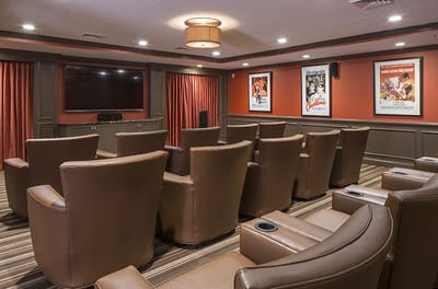 Comfortable movie theater seating in a common area