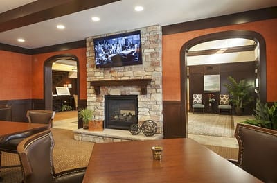 Interior view of a cozy common area with fireplace